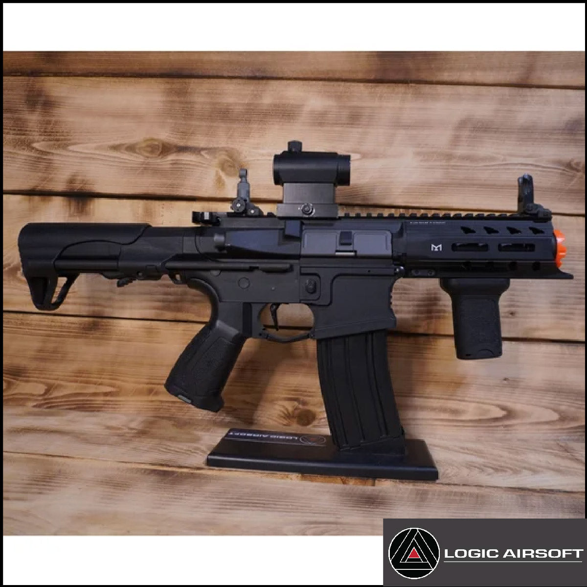 Black airsoft AEG rifle with front rail and adjustable stock, side view